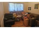 Inviting living room offers space and light at 8611 Emerson Ct, Denver, CO 80229