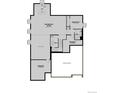 Basement floor plan featuring a recreation room, bar, unfinished storage and bedroom 7 at 8644 Pennycress Dr, Littleton, CO 80125
