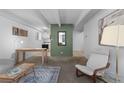 Open-concept living space includes a dining area and seamless access to the kitchen at 555 E 10Th Ave # 15, Denver, CO 80203