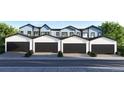 Row of modern townhomes with black garage doors and contrasting trim; appealing facade, fresh exterior at 1337 N Alton St, Aurora, CO 80010