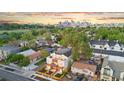 An aerial view of a neighborhood showing the proximity to downtown, Denver, from this home at 1052 N Knox Ct, Denver, CO 80204