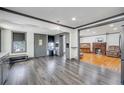 Living room with views of the fireplace and dining area at 2226 Fulton St, Aurora, CO 80010