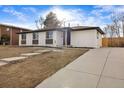 Charming ranch-style home featuring a brick facade, ample windows, and a well-maintained front yard at 8051 Clarkson Ct, Denver, CO 80229