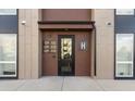 Apartment complex featuring visible unit numbers, modern architecture, and easy access entrance at 8475 E 36Th Ave # 131, Denver, CO 80238