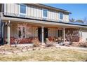 Charming front porch with inviting seating area perfect for enjoying the neighborhood views at 1740 Bear Mountain Dr, Boulder, CO 80305