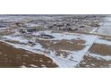 Aerial view showing home's location in a quiet, residential neighborhood at 4220 Headlight Rd, Strasburg, CO 80136