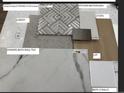 A collection of flooring, backsplash, wall, and countertop samples showcases the variety of design options available at 22 Waterford St, Erie, CO 80516