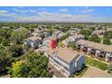 An aerial view that shows the community and surroundings, highlighting the property's location at 4220 E 119Th Pl # A, Thornton, CO 80233