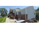 Charming townhome with a mix of brick and siding, complemented by a cozy front porch at 4220 E 119Th Pl # A, Thornton, CO 80233
