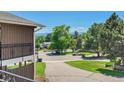 Scenic street view from balcony shows lovely neighborhood and mountain views at 2682 S Benton St, Lakewood, CO 80227