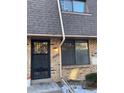 Townhouse exterior featuring a private entrance and well-maintained landscaping at 1731 Quail St, Lakewood, CO 80215