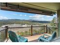 Relaxing deck with seating and incredible mountain views at 27341 Ridge Trl, Conifer, CO 80433