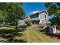 Attractive home exterior featuring ample windows and a spacious yard at 8853 N Awl Rd, Parker, CO 80138