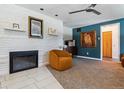Cozy living room with fireplace, comfortable seating, and stylish decor creates a relaxing and inviting space at 8540 W 59Th Ave, Arvada, CO 80004