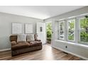 Inviting living room with a large window seat and comfortable seating area at 1172 S Zeno Way # F, Aurora, CO 80017