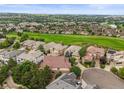 A beautiful community surrounded by lush greenery and rolling green hills at 6542 S Tempe St, Aurora, CO 80016