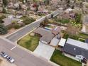 Aerial view showcasing a home with a pool and backyard oasis in a residential neighborhood at 2698 E Cresthill Ave, Centennial, CO 80121
