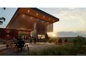 The community boasts a luxurious outdoor gathering space, complete with a fireplace and comfortable seating areas at 3768 Backslope Ln, Castle Rock, CO 80108