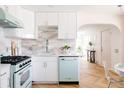 Bright kitchen with updated appliances and white countertops at 1010 N Jasmine St, Denver, CO 80220