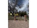 Property featuring a fenced yard with a mix of gravel and grass at 1395 Havana St, Aurora, CO 80010