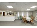 Relaxing meeting room features a round table, chairs, and large bright windows at 3675 S Cherokee S St # 710, Englewood, CO 80110