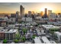 Breathtaking aerial view of the Denver skyline at sunset, showcasing the city's vibrant cityscape at 1729 N Clarkson St, Denver, CO 80218