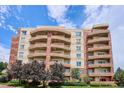 Multi-story condo with private balconies, offering a comfortable urban living experience at 4875 S Monaco St # 303, Denver, CO 80237