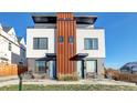 Modern townhome featuring a striking facade, private entrances, and a contemporary design at 1286 Raleigh St, Denver, CO 80204