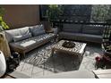 Serene balcony featuring comfortable seating and a patterned rug for relaxation at 6985 Fallon Cir, Castle Rock, CO 80104