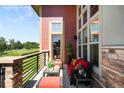 Cozy balcony with comfortable seating and scenic views of the outdoors at 10243 Spring Green Dr, Englewood, CO 80112