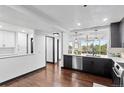 Contemporary kitchen featuring stainless steel appliances and sleek, modern cabinetry at 1900 E Girard Pl # 505, Englewood, CO 80113