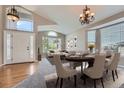Bright and airy living space featuring a dining area, and abundant natural light at 22436 E Maplewood Pl, Aurora, CO 80015
