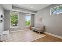 Bright room with large windows, a cozy sofa, and stylish decor at 2508 S Pennsylvania St, Denver, CO 80210