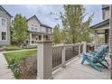 Inviting front porch with comfortable seating and charming architectural details, perfect for relaxing outdoors at 8917 Yates Dr, Westminster, CO 80031