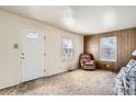 Cozy living room with natural light and classic decor elements at 1805 W Stoll Pl, Denver, CO 80221