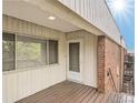 Exterior entrance of property with a mix of brick and siding at 3663 S Sheridan Blvd # J12, Denver, CO 80235
