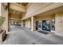 Inviting entrance with covered walkway, stone accents, and modern doors at 300 W 11Th Ave # 5I, Denver, CO 80204