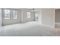Spacious living room with large windows and ample natural light at 300 W 11Th Ave # 5I, Denver, CO 80204