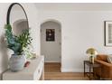 Inviting hallway featuring a stylish mirror, console table, and tasteful decor, leading to other rooms at 1410 Vine St # 3, Denver, CO 80206