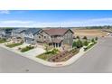 Beautiful home on a corner lot in a suburban neighborhood with construction in the distance at 15100 Gaylord St, Thornton, CO 80602