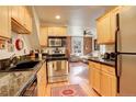 Efficient kitchen flows into the living area, creating an open and airy space at 124 E Colorado Ave # 2, Denver, CO 80210