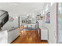 Spacious living room with hardwood floors and an open-concept layout at 4544 Utica St, Denver, CO 80212