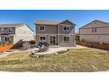 Spacious backyard featuring a patio, perfect for outdoor dining and entertaining at 7506 Sabino Ln, Castle Rock, CO 80108