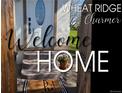 Inviting front entrance with decorative door and stylish welcome home decor at 3015 Pierce St, Wheat Ridge, CO 80214