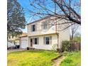 Well-maintained two-story house with attached garage, complemented by a neatly kept lawn at 10781 Moore St, Westminster, CO 80021