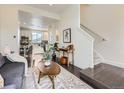 Open-concept living space with a view of the dining area and kitchen at 2507 Moline St, Aurora, CO 80010