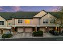 Well-maintained townhomes with attached garages and covered parking at 2154 Concord Ln, Superior, CO 80027