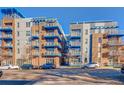 Contemporary apartment building with ample parking at 1488 Madison St # 310, Denver, CO 80206