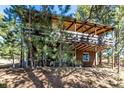 Stunning two-story home with deck surrounded by mature trees, offering privacy and a tranquil setting at 7105 Flagstaff Rd, Boulder, CO 80302