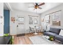 Cozy living room featuring a neutral color palette, modern furnishings, and natural light at 4151 Zenobia St, Denver, CO 80212